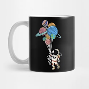 Astronaut Holding Planet Balloons Mug